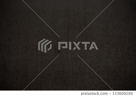 Flat design dark grey textured surface is showing wall look, with subtle streaks and speckles 133609280