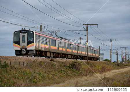 Four E129 series local trains running on the Shinetsu Main Line 133609665
