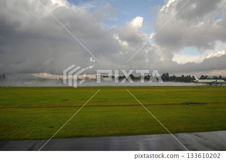 bogota airport landing and taking off strip under the rain bogota airport landing and taking off strip under the rain 133610202