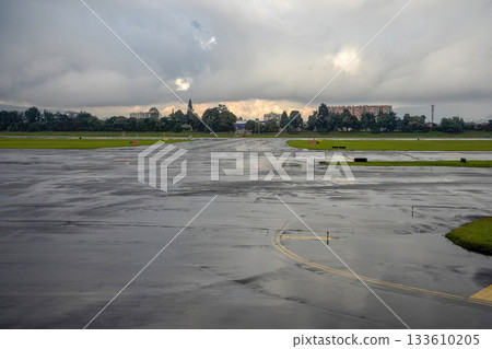 bogota airport landing and taking off strip under the rain bogota airport landing and taking off strip under the rain 133610205