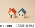 Cute miniature house models with red and blue roofs 133610498