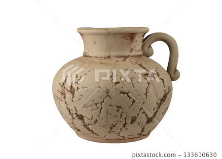 A beautifully rustic ceramic jug with a single curved handle and a distressed, textured finish A beautifully rustic ceramic jug with a single curved handle and a distressed, textured finish 133610630