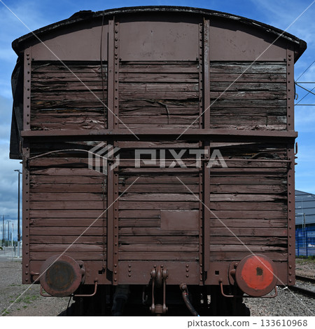 the rear view of a vintage wooden freight railcar the rear view of a vintage wooden freight railcar 133610968
