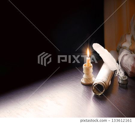 Paper and quill on the table 133612161