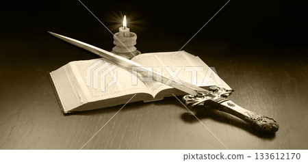 Old book and sword on the table Old book and sword on the table 133612170
