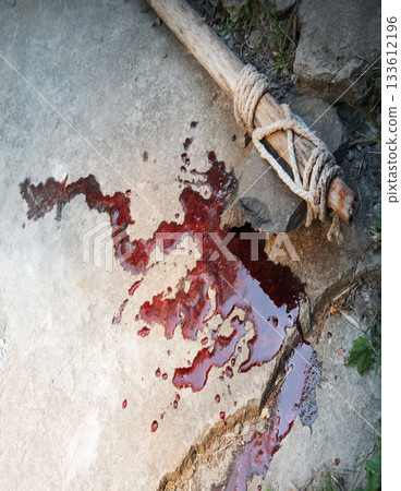 Stone axe with red blood Stone axe with red blood 133612196