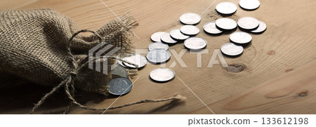 Silver coins in the bag Silver coins in the bag 133612198