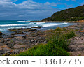 The surf crashing against the rocks and the beautiful coastline. 133612735