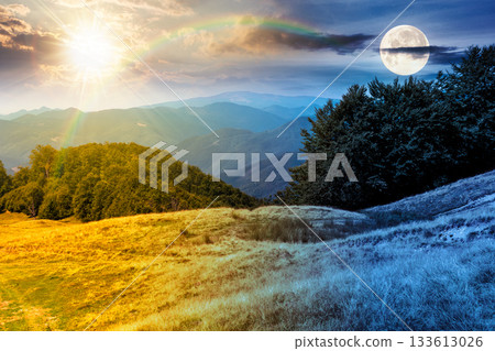beautiful mountain landscape with beech trees on rolling hills. day and night time change concept. scenic view of alpine countryside scenery with sun and moon at twilight. equality and shift template beautiful mountain landscape with beech trees on rolling hills. day and night time change concept. scenic view of alpine countryside scenery with sun and moon at twilight. equality and shift template 133613026