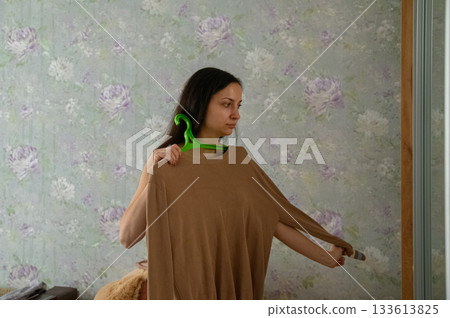Morning Routine of a Young Woman at Home 133613825