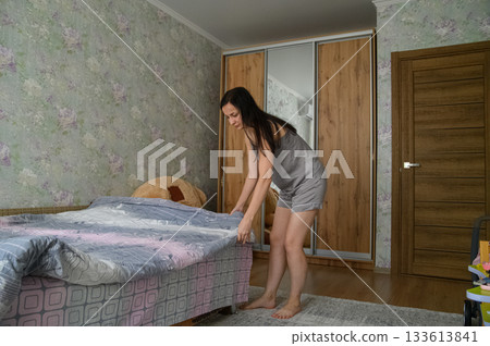 Morning Routine of a Young Woman at Home 133613841