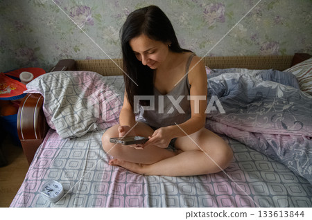 Morning Routine of a Young Woman at Home 133613844