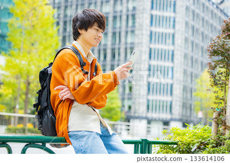 Men with smartphones 133614106