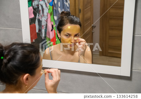 Daily Skincare Routine at Home in the Bathroom 133614258