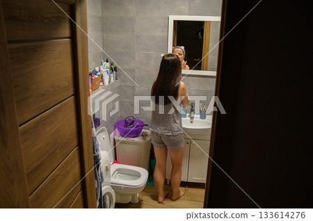 Daily Skincare Routine at Home in the Bathroom Daily Skincare Routine at Home in the Bathroom 133614276