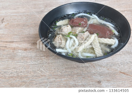 Vietnamese rice noodles or Pho with slice sausage and chop pork couple blood in soup on bowl   133614505