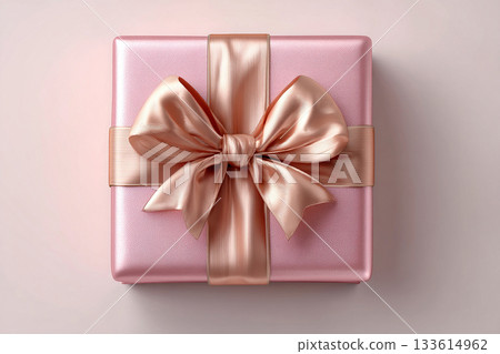 Holiday packaging. Top view. Square pink box wrapped with a silver bow on white background. Jewelry, birthdays and luxury branding. Elegant packaging. Holiday packaging. Top view. Square pink box wrapped with a silver bow on white background. Jewelry, birthdays and luxury branding. Elegant packaging. 133614962
