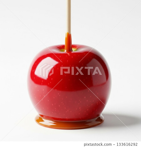 Shiny Red Candy Apple on a Stick with Caramel Drip on White Background Shiny Red Candy Apple on a Stick with Caramel Drip on White Background 133616292