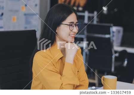 Business woman using calculator for do math finance on wooden desk in office and business working background, tax, accounting, statistics and analytic research concept. Business woman using calculator for do math finance on wooden desk in office and business working background, tax, accounting, statistics and analytic research concept. 133617459