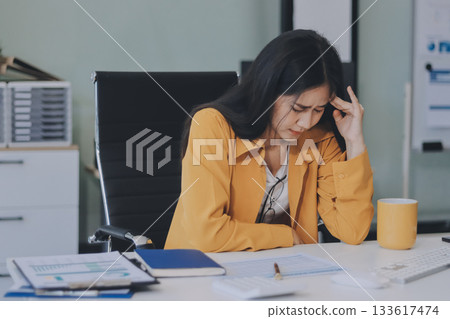 Headache, business woman at night and computer stress while working for a deadline with pc glitch. Sad corporate manager with anxiety about target working at desk screen late to complete task online 133617474