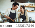 Couple enjoying cooking in the kitchen 133617849