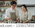 Couple having fun cooking 133617850