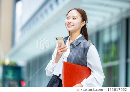 Businesswoman in an office district 133617962