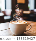 White coffee cup with latte art and rising coffee beans in steam image 133619427