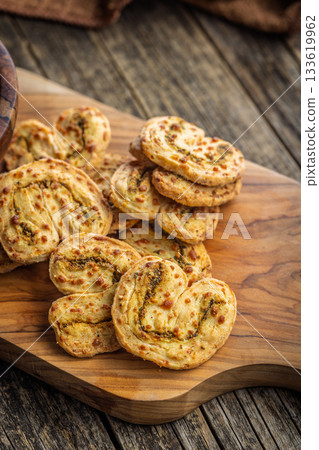 Crunchy salted crackers on wooden table. 133619962