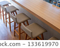 Counter seats with natural light streaming in - Restaurant interior 133619970