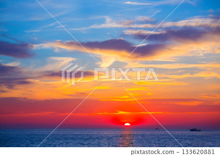 Ibiza San Antonio magic sunset red sky clouds 133620881