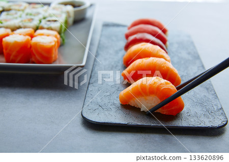 Sushi Maki and Niguiri soy sauce and wasabi Sushi Maki and Niguiri soy sauce and wasabi 133620896