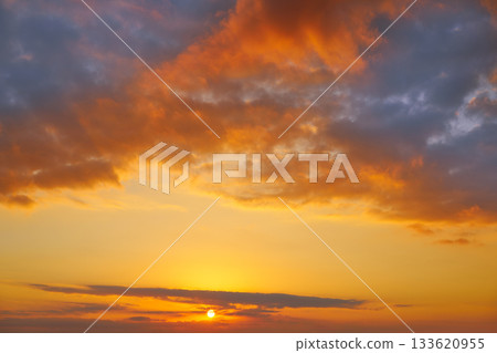 Sunset sky clouds orange and blue Sunset sky clouds orange and blue 133620955