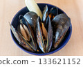 Horizontal composition of mussel appetizer with lemon. Natural food photo. 133621152