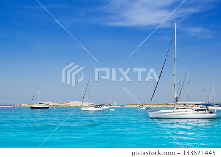 sailboats in turquoise beach of Formentera sailboats in turquoise beach of Formentera 133621445