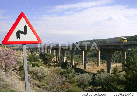 Double curve road sign signal and bridge road traffic Double curve road sign signal and bridge road traffic 133621446