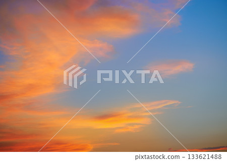 Sunset sky clouds orange and blue Sunset sky clouds orange and blue 133621488