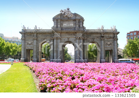 Madrid Puerta de Alcala with flower gardens 133621505