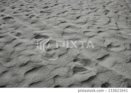 Beach sand waves warm texture background Beach sand waves warm texture background 133621641