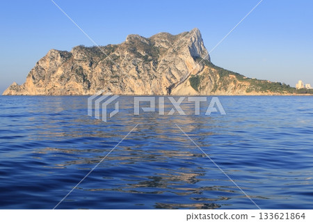 Ifach Penon mountain in Calpe from blue sea 133621864