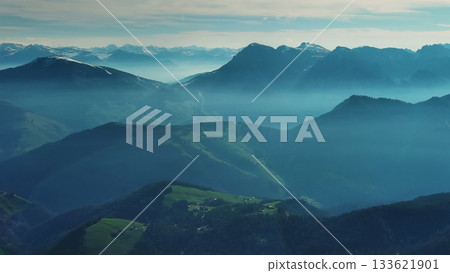 Aerial view of mountains under mist morning Aerial view of mountains under mist morning 133621901
