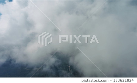 Clouds and blue sky, flying in clouds Clouds and blue sky, flying in clouds 133621924