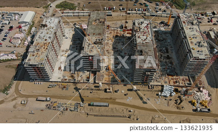 Industrial construction site with houses equipment and materials Industrial construction site with houses equipment and materials 133621935