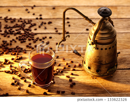 Coffee with vintage machine on aged wood 133622326