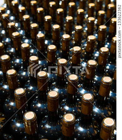 Wine bottles in a row as a pattern with cork Wine bottles in a row as a pattern with cork 133622362