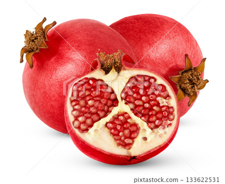 Ripe fresh pomegranate with cut in half isolated on white background. Pink pomegranates with clipping path. Ripe fresh pomegranate with cut in half isolated on white background. Pink pomegranates with clipping path. 133622531