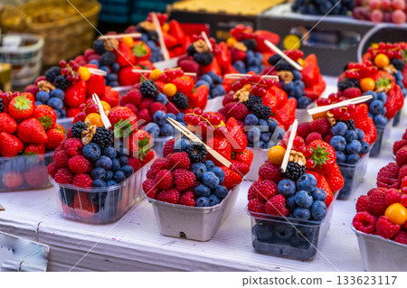 Fruit bowl on food market sale. Vitamin food. Berries red and blue 133623117