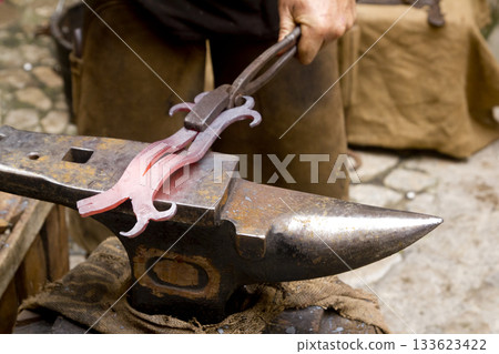 blacksmith forged iron smith anvil hammerman blacksmith forged iron smith anvil hammerman 133623422