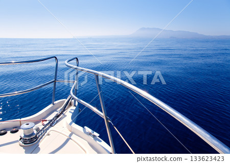 Boat bow sailing in blue Mediterranean sea 133623423
