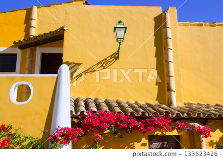 Mediterranean yellow houses in Cala Fornells Mallorca Mediterranean yellow houses in Cala Fornells Mallorca 133623426